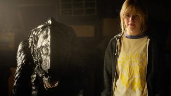 Xeno movie: An alien stands next to a teen girl (Lulu Wilson), who's not sure what to do