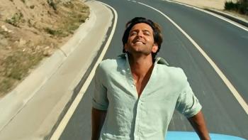 Zindagi Na Milegi Dobara: A man sits back in a convertible car enjoying the drive.