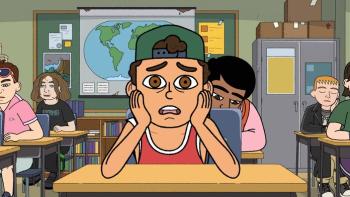 A young boy in a green backwards baseball cap and a red Bulls jersey leans his head in his hands. He sits in a classroom.