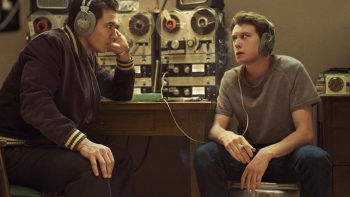 11.22.63 TV show: Jake and Bill listen in on wiretaps next to a big tape deck, looking at each other warily
