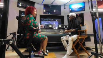  The 1619 Project TV show: Nikole Hannah-Jones interviews someone in a music studio.