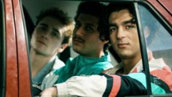 4 Blocks Zero: the younger Hamadys ride in the back of a car