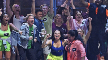 99 to Beat TV show screenshot 2: Participants cheer contestants on. 