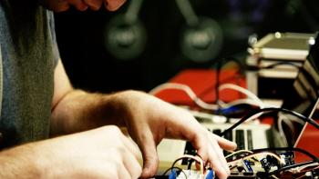America's Greatest Makers: A man works on electrical equipment