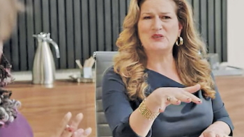 New CEO Katherine Hastings in a meeting. 
