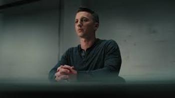 American Nightmare TV show screenshot 2: Aaron Quinn sits a table with his hands crossed in American Nightmare.