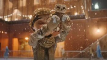 An Almost Christmas Story TV: Luna holds up Moon while smiling and skating at the ice skating park during Christmas.