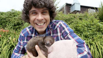Andy's Baby Animals: Andy with a baby sloth. 