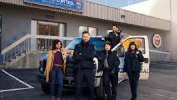 Animal Control TV show: The case of three men and two women stand in front of their Animal Control office around an official Animal Control truck 