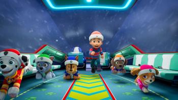 A PAW Patrol Christmas TV show screenshot 3: Marshall, Rocky, Chase, Ryder, Zuma and Sky race out of the Paw Patrol plane during a winter storm.