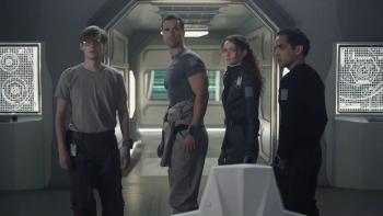 The Ark TV show screenshot 2: the spaceship's crew stands in a hallway