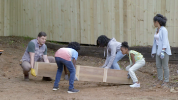 Backyard Blowout TV Show: Working hard to build garden beds. 