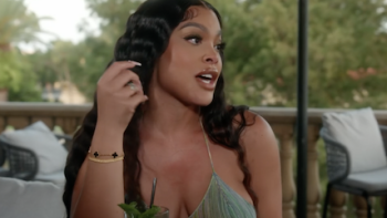 Basketball Wives Orlando screenshot 1: Meghan James has a cocktail and talks. 