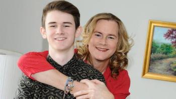 Becoming Us TV show: Carly embraces her son Ben, both smiling inside a family home