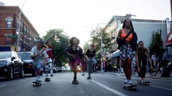 Betty TV show: A group of skaters role down a street in NYC