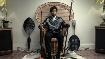 The Big Cigar TV show screenshot 1: Andre Holland recreates an iconic photo of Huey P. Newton