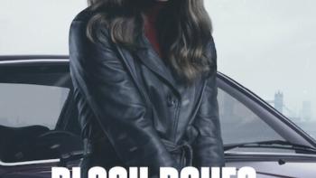 Black Doves TV show screenshot 1: Ben Whishaw and Keira Knightly sit in a car. Whishaw grips the steering wheel and Knightly’s face is bloodied.