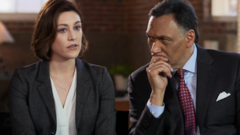 Bluff City Law TV Series: Sidney and Elijiah discussing a case. 