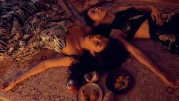 Born for the Spotlight TV show screenshot #1: Two young Asian women lie on the floor