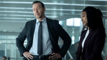 Boston Blue: Donnie Wahlberg and Sonequa Martin-Green solving the case in the police department. 