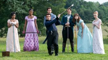 Bridgerton Season 2 TV show screenshot 1: The Sharmas and Bridgertons play croquet on a green lawn dressed in period clothing