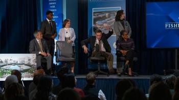 The Chair Company TV show screenshot 3: Trosper falls out of his chair in front of a large crowd