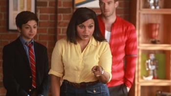 Champions TV Series: A woman stands in front of a man and a teen boy; the woman is pointing her finger and looks stern. 