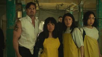 Jay Ryan, Perlina Lau, JJ Fong, and Ally Xue stand in a warehouse, cornered by masked people.