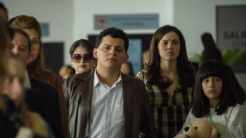 Dear Killer Nannies TV show screenshot 3: 16 year old Juampi in line at the airport with his mother, girlfriend, and sister trying to leave Medellín.