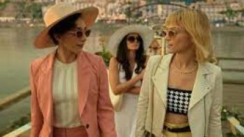 Death and Other Details Screenshot #1: Three well-dressed women walk on a cruise ship