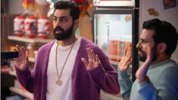 Deli Boys TV show screenshot 2: : Saagar Shaikh and Asif Ali hold their hands up in surrender. 