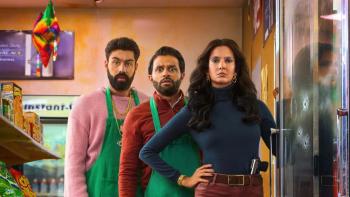 Deli Boys TV show screenshot 3: Saagar Shaikh and Asif Ali stand behind Poorna Jagannathan.
