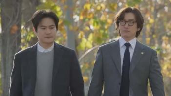 Cho Seung-woo and Kim Seong-gyoon walking outside.