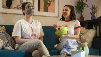 Dollface TV Series: Jules (Kat Dennings) gets a mask from Izzy (Esther Povitsky)