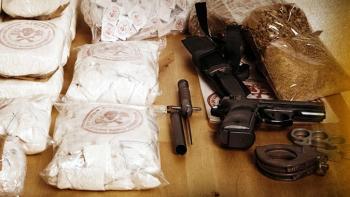 Dope Series: Confiscated drugs and weapons. 