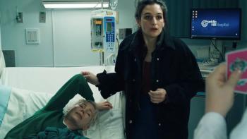 Dying for Sex TV show screenshot 2: Nikki stands over Molly in a hospital bed, holding her hand