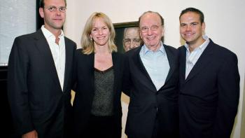 Dynasty: The Murdochs screenshot: Lachlan, Liz, Rupert and James Murdoch stand with their arms across each other.