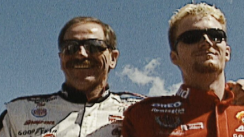 Earnhardt TV show screenshot 3: Dale Earnhardt, Sr. in white with arm around shoulders of Dale Earnhardt, Jr. wearing red.