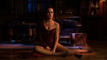 The Eastern Gate TV show screenshot 1: Ewa in a fancy dress, sitting on the floor, covered in blood