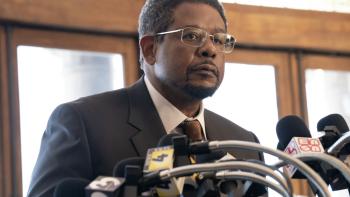 Emperor of Ocean Park TV show screenshot 1: Forest Whitaker stands at a podium surrounded by microphones.
