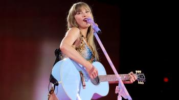 Taylor Swift: The End of an Era TV show: Taylor plays guitar on stage