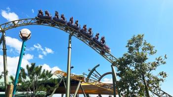 Inside the Worlds of Epic Universe TV show screenshot: A group of people ride a roller coster.