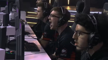 Esports World Cup: Level Up TV show screenshot 2: Gamers in black shirts sitting and playing at monitors. 