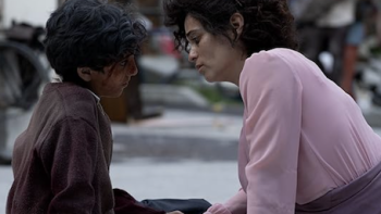 Every Minute Counts TV show screenshot 3: Gabriela sits and comforts her rescued son.