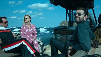 Extrapolations: A group of apparantly wealthy people lounge in front of a melting glacier