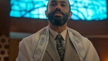 Extrapolations: A rabbi (Daveed Diggs) preaches in front of a stained-glass window