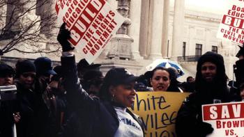 Eyes on the Prize III: We Who Believe in Freedom Cannot Rest TV show screenshot 2: protesters raise signs. 