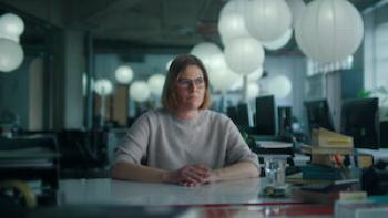 Fred and Rose West: A British Horror Story: A female reporter is shown sitting at her desk looking at the camera.