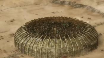 Gachiakuta TV show TV show screenshot 2: An aerial view of the Sphere city, surrounded by tan desert and a gigantic wall