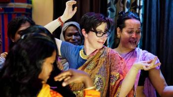 The Ganges with Sue Perkins: Sue Perkins dances surrounded by women of the Hijra community in brightly colored saris.